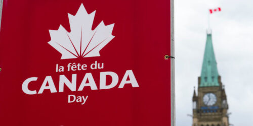 Signs are pictured on Parliament Hill prior to Canada Day, in Ottawa on Monday, June 27, 2022. THE CANADIAN PRESS/Sean Kilpatrick